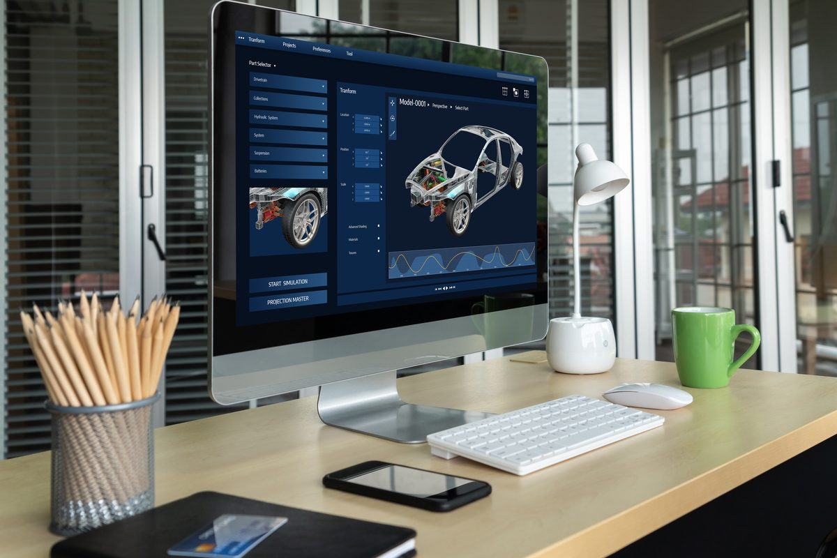 Desktop monitor showing an engineering simulation of a car model