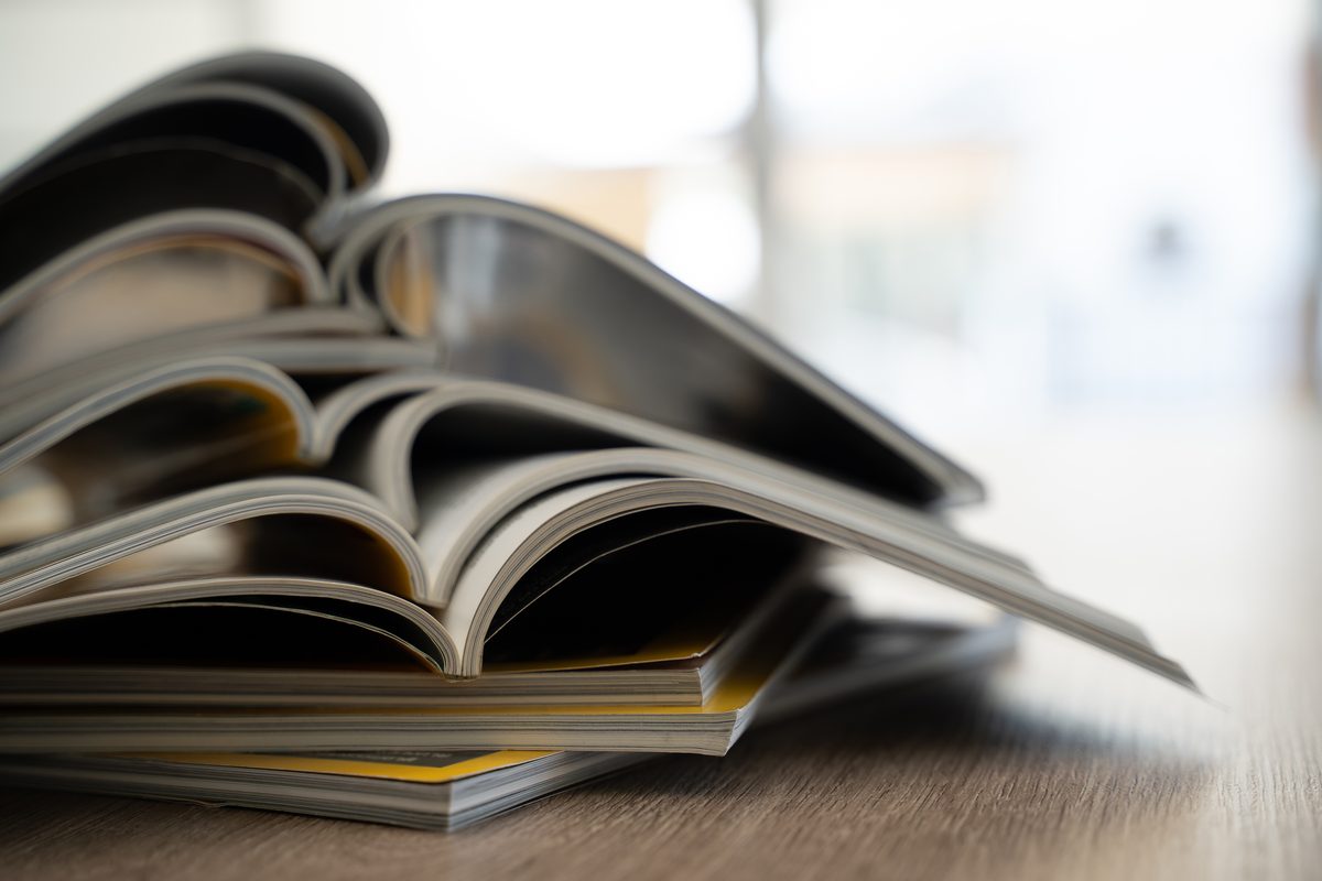 Stack of open printed journals